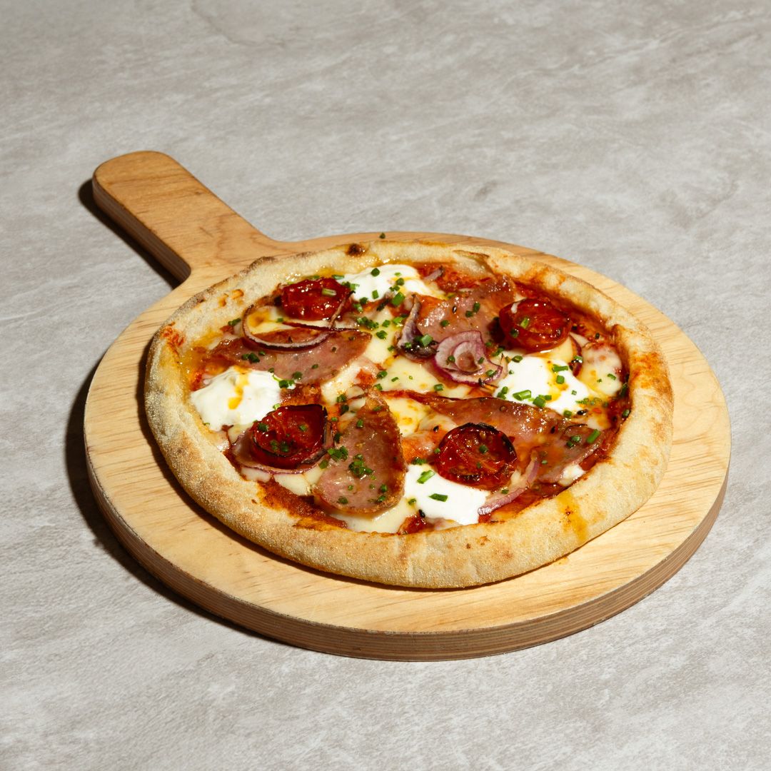 Calabrian pizza with salami and spicy honey