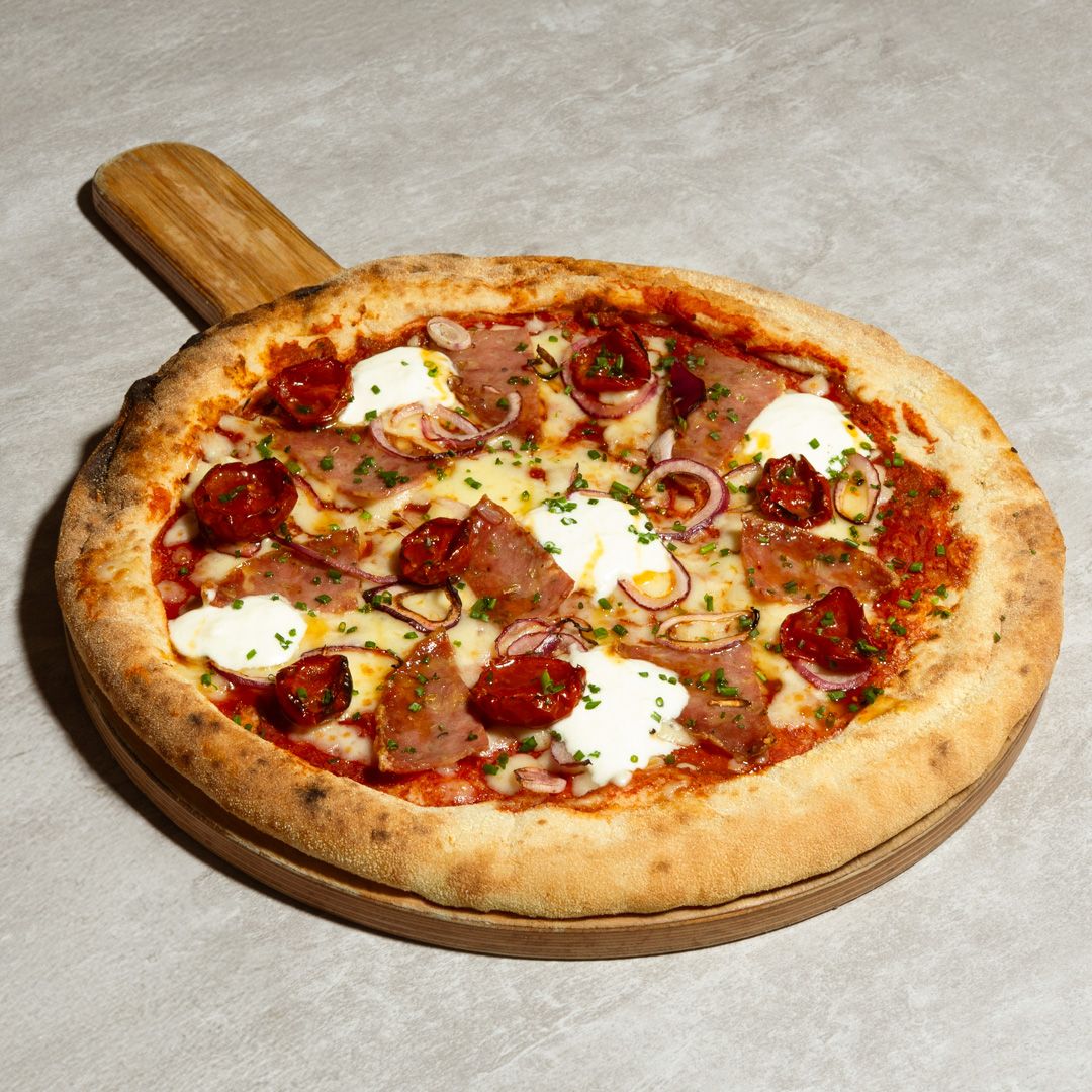 Calabrian pizza with salami and spicy honey